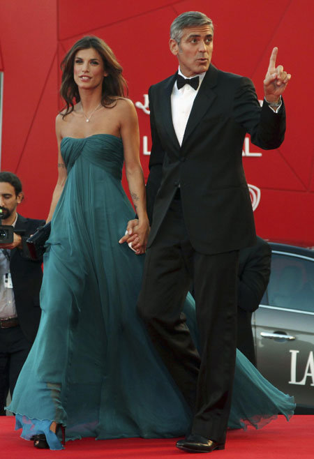 George Clooney and his girlfriend on red carpet at 66th Venice Film Festival