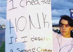 美國19歲出軌女子舉牌認(rèn)錯欲挽回感情