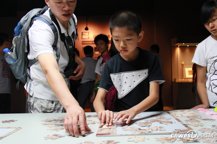 陜西歷博開放文物修復(fù) 看“巧手良醫(yī)”還原歷史