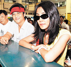 王菲產(chǎn)后不憂郁(圖)