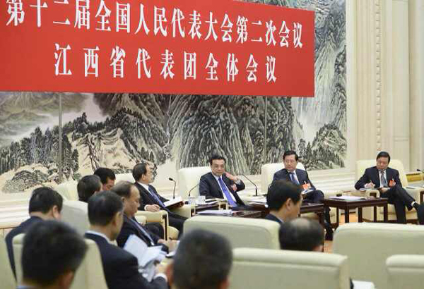 李克強參加江西代表團討論 揪心失聯(lián)飛機乘客