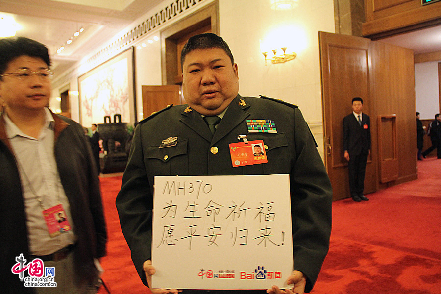 全國政協(xié)委員為馬航失聯(lián)航班乘客祈福