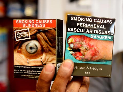 全球首個(gè)香煙統(tǒng)一包裝法律在澳生效 印警示圖減吸引力