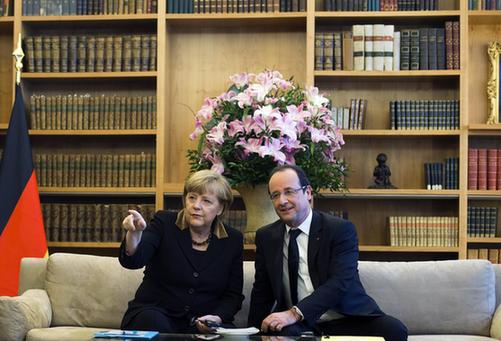 圖:德法兩國(guó)慶“金婚” 默克爾奧朗德“秀恩愛(ài)”