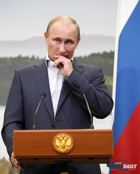 英官員:普京有條件默許阿薩德下臺(tái) 敘和談?dòng)邢M? style=