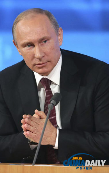 普京不經(jīng)意間流露對華友好 親點中國記者提問