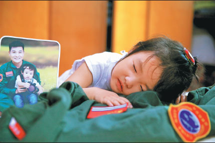 Navy widow tells of pain of husband's death