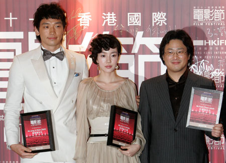 South Korean director Park Chan-wook (R), actress Lim Su-jeong (C) and actor Jung Ji-Hoon, also known as Rain, attend the gala premiere of their movie