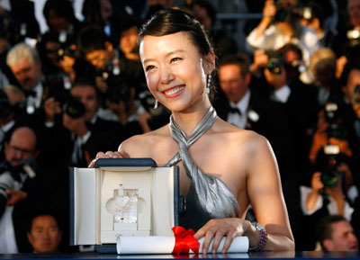 Jeon Do-yeon holds the Best Actress award for her role in South Korean director Lee Chang-dong's film