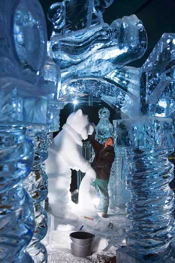 John McKinnon of Canada puts the finishing touch to his ice sculpture of a Dutch fairy tale at the fourth Snow and Ice Sculpture Festival in Eindhoven December 7, 2006. The festival starts December 9 and lasts until January 7, 2007.