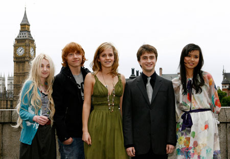Actors L-R: Evanna Lynch,Rupert Grint, Emma Watson, Daniel Radcliffe and Katie Leung pose during a photocall to promote the new film