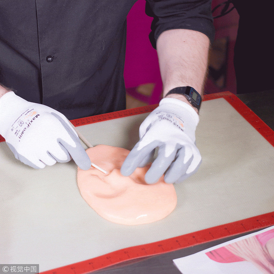 個(gè)性定制人臉棒棒糖讓你吃自己的“臉”（組圖）