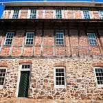 In one downtown's shadow, life moves slowly