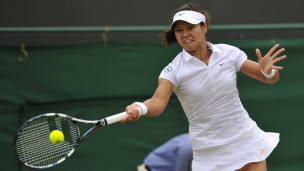 李娜溫網(wǎng)進八強 承認賽前很緊張