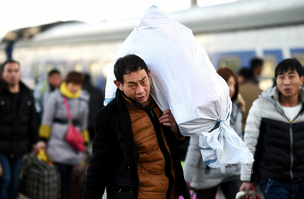 中國(guó)日?qǐng)?bào)直擊全國(guó)春運(yùn)首日（組圖）