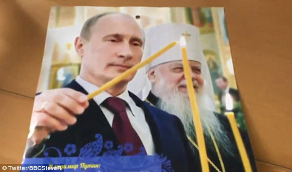 普京2017新日歷亮相:抱小貓孩子大秀溫情(組圖)