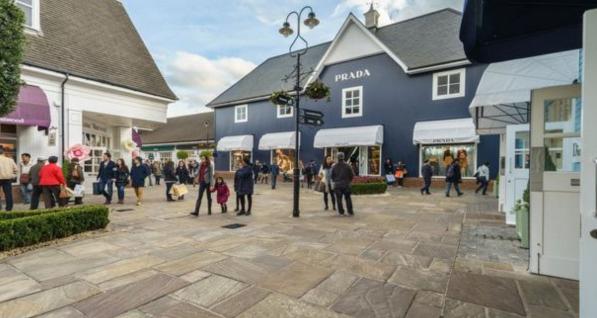 中國人狂愛比斯特驚動BBC，但這家折扣村早被外媒扒皮了