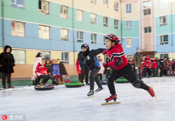 School in Jilin builds its own ice rink