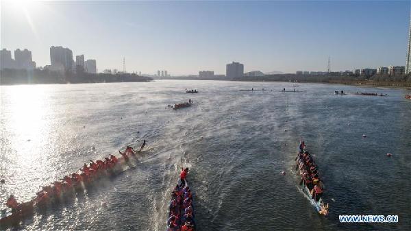 Winter dragon boat race held in NE China's Jilin