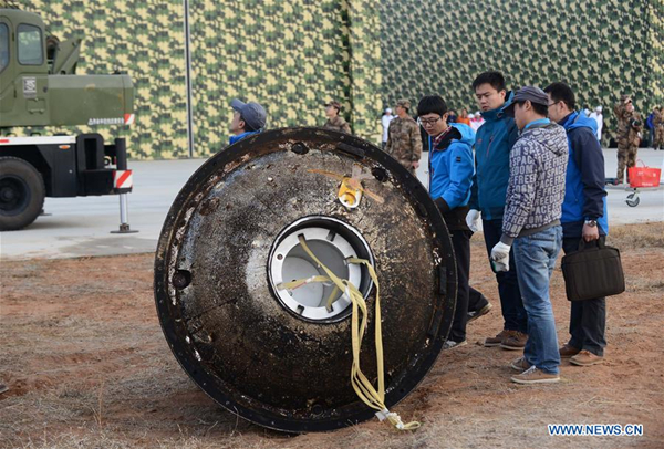 Re-entry capsule of SJ-10 lands in North China