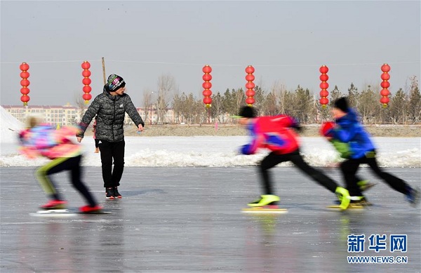 Ice skating on frozen Xilin Lake