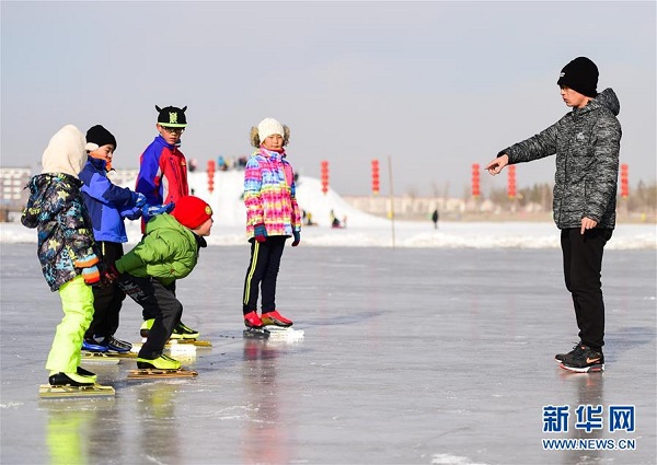 Ice skating on frozen Xilin Lake
