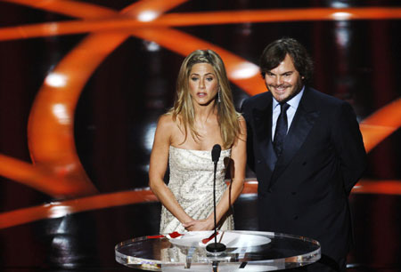 Presenter Jennifer Aniston poses backstage at Oscars