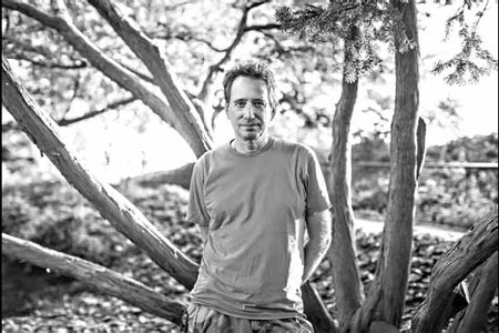 Outsider gets his due, but he's still restless