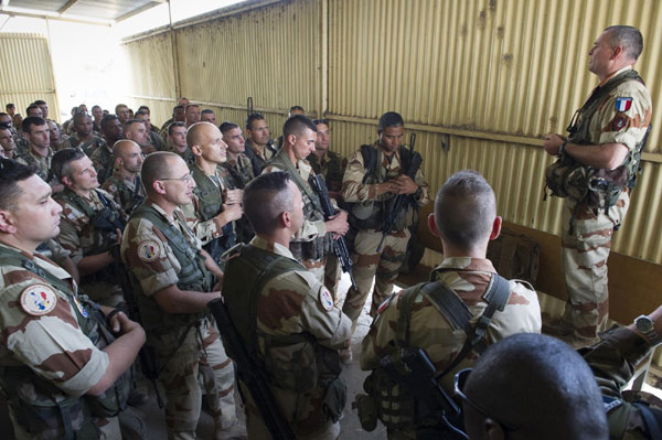 French troops are briefed for a mission in N'Djamena, Chad, in this photo released by the French Army Communications Audiovisual office (ECPAD) on January 12, 2013. France extends air raids in Mali