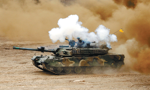 An ROK tank takes part in an exercise against possible attacks by Pyongyang, near the demilitarized zone in Hwacheon, the Republic of Korea, on Monday. Lee Hae-ryong / Yonhap via Associated Press DPRK legislators meet amid nuclear tension