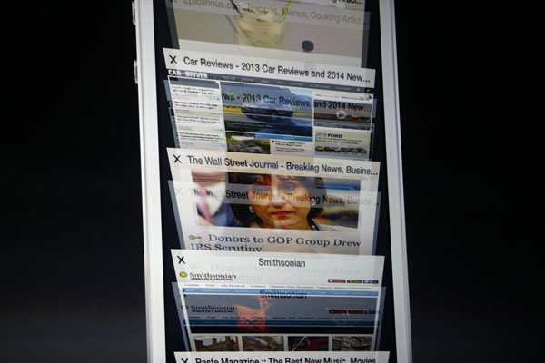 The scrolling feature on Apple iOS7 Safari web browser is presented during Apple Worldwide Developers Conference (WWDC) 2013 in San Francisco, California June 10, 2013. Apple unveils new mobile software platform