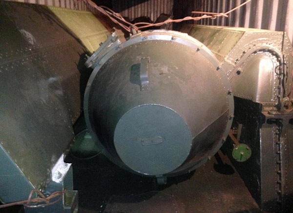 A long, green missile-shaped object is seen inside the North Korean flagged ship 'Chong Chon Gang' docked at the Manzanillo Container Terminal in Colon City July 16, 2013. DPRK demands Panama free seized ship carrying arms