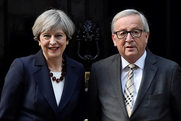 Britain's May tells EU's Juncker she wants