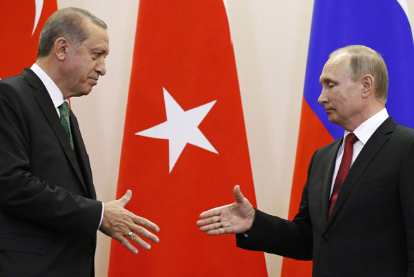 Russia, Turkey agree to remove trade restrictions